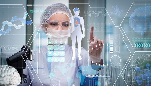 healthcare worker looking at data